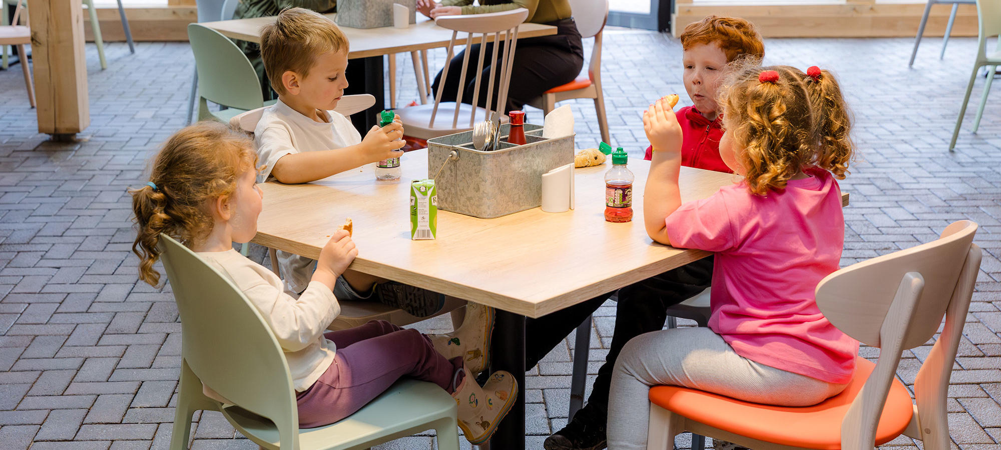 Children enjoying a snack in The Farmers Table restaurant